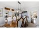 Dining room featuring classic wood furniture, elegant decor, and views of other rooms at 1004 Colworth Way, Raleigh, NC 27614