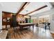 Spacious game room featuring a pool table, wood accents, recessed lighting and ample seating at 1004 Colworth Way, Raleigh, NC 27614