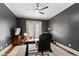 Elegant home office with a dark-colored desk and an ergonomic chair at 1004 Colworth Way, Raleigh, NC 27614