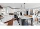 Modern kitchen with stainless steel appliances, white cabinets, granite countertops, island with seating at 1004 Colworth Way, Raleigh, NC 27614