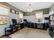 Bright office space with natural light, black desks, custom millwork and neutral rug at 1004 Colworth Way, Raleigh, NC 27614