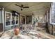 Inviting covered patio offers outdoor living with ceiling fans and TV at 1004 Colworth Way, Raleigh, NC 27614
