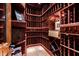 Elaborate wine cellar featuring custom wood racking and tile flooring at 1004 Colworth Way, Raleigh, NC 27614