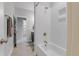 Bright bathroom showcasing a tiled shower and a neutral-colored vanity at 1129 Sequoia Creek Ln, Cary, NC 27519