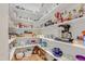Walk-in pantry with an abundance of shelving and storage space at 1129 Sequoia Creek Ln, Cary, NC 27519