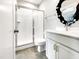 Modern bathroom with walk-in shower and tile flooring and vanity with white cabinets at 120 Breyla Way, Holly Springs, NC 27540