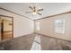 Spacious bedroom with two windows allowing lots of natural light and ceiling fan at 136 Pelham St, Haw River, NC 27258