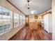 Bright and airy kitchen with a large island, wood cabinets, and an abundance of natural light at 136 Pelham St, Haw River, NC 27258