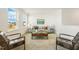 Cozy living room featuring a comfortable sofa and stylish decor at 143 Rossell Park Cir, Garner, NC 27529