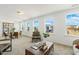 Open-concept living space with a dining area and neighborhood views at 143 Rossell Park Cir, Garner, NC 27529