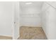 Spacious walk-in closet with ample shelving and carpeting at 143 Rossell Park Cir, Garner, NC 27529