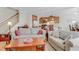 Open-concept living room flows into the kitchen, with hardwood floors and ample seating space at 146 Skyros Loop, Cary, NC 27519