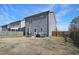 Well-maintained backyard features a patio and lawn at 15 Mcdowell Pkwy, Clayton, NC 27520
