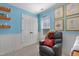 ' bedroom featuring Harry Potter decor, a gray leather recliner, and ample natural light at 15 Mcdowell Pkwy, Clayton, NC 27520