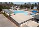 Aerial view of the community pool featuring water slides, lap lanes, splash features and bath house at 15 Mcdowell Pkwy, Clayton, NC 27520