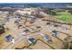 Aerial view of a neighborhood with well-maintained homes and landscaping in a suburban setting at 171 Piney Field Rd, Fuquay Varina, NC 27526