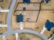 Bird's-eye view highlighting a home with a large backyard and driveway in a suburban community at 171 Piney Field Rd, Fuquay Varina, NC 27526