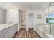 Bright primary bath features a soaking tub and a dual-sink vanity at 171 Piney Field Rd, Fuquay Varina, NC 27526