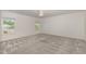 Spacious carpeted bedroom with two windows allowing for ample natural light at 171 Piney Field Rd, Fuquay Varina, NC 27526