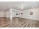 Spacious living room featuring hardwood flooring, recessed lighting, and an open floor plan at 171 Piney Field Rd, Fuquay Varina, NC 27526