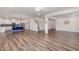 Spacious open-concept with hardwood flooring, living room, kitchen and staircase at 171 Piney Field Rd, Fuquay Varina, NC 27526