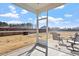 View from the screened porch showing a large yard and outdoor seating area at 171 Piney Field Rd, Fuquay Varina, NC 27526