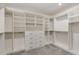 Expansive walk-in closet with custom shelving and drawers providing ample storage at 171 Piney Field Rd, Fuquay Varina, NC 27526
