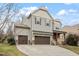 Charming two-story home with attached three-car garage and a spacious driveway at 1720 Waddell Ct, Durham, NC 27703