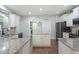 Bright and airy kitchen with granite countertops, and access to laundry and pantry at 1720 Waddell Ct, Durham, NC 27703