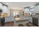 Well-lit kitchen featuring granite countertops and ample cabinet space at 1720 Waddell Ct, Durham, NC 27703