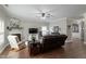 Comfortable living room showcasing a fireplace, ceiling fan, and stylish decor at 1720 Waddell Ct, Durham, NC 27703