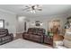 Open-concept living area with views into the kitchen and dining space at 1720 Waddell Ct, Durham, NC 27703