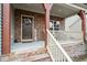 A home's entryway with stone pillars, a welcome sign, and light-colored porch steps at 1720 Waddell Ct, Durham, NC 27703