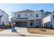 Charming two-story home with a two-car garage and covered entry at 1730 Pie Filling Dr, Haw River, NC 27258