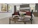 Inviting bedroom with a decorative accent wall, stylish furniture, and lots of natural light at 186 Ethel Ln, Angier, NC 27501