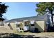 Modest single story home with a classic design and awning window covers at 1960 Brogden Rd, Smithfield, NC 27577