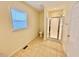Bright bathroom featuring a glass shower and toilet at 2001 S Ashland Dr, Burlington, NC 27217