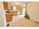Kitchen with wood cabinets and tile flooring at 2001 S Ashland Dr, Burlington, NC 27217