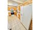 Traditional kitchen features neutral cabinets, tile floors and white refrigerator appliance at 2001 S Ashland Dr, Burlington, NC 27217