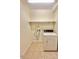 Practical laundry room with tiled floor and a dryer at 2001 S Ashland Dr, Burlington, NC 27217