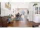 Open dining area adjacent to the kitchen, features hardwood floors, and stylish accents at 204 E Murray Ave, Durham, NC 27704