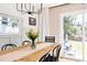 The dining room boasts a wooden table with black chairs and natural light, perfect for meals at 204 E Murray Ave, Durham, NC 27704