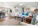 Inviting living room with hardwood floors, an open layout and access to the dining area and kitchen at 204 E Murray Ave, Durham, NC 27704