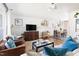 Bright and airy living room featuring hardwood floors, comfortable seating, and stylish decor at 204 E Murray Ave, Durham, NC 27704