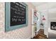 Well-organized walk-in pantry offers ample storage, and features unique wallpaper at 204 E Murray Ave, Durham, NC 27704