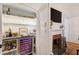 Custom bar area with wine fridge, shelving, and beverage storage at 206 S Salem St, Apex, NC 27502