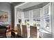 Bay window seating offers natural light and neighborhood views in the dining area at 206 S Salem St, Apex, NC 27502