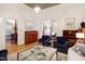 Spacious living room with hardwood floors, stylish furnishings and generous natural light at 206 S Salem St, Apex, NC 27502
