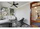 Relaxing screened porch with comfortable seating and view of the outdoors at 206 S Salem St, Apex, NC 27502