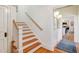 Traditional wood stairway leading to the upper level of the home at 206 S Salem St, Apex, NC 27502